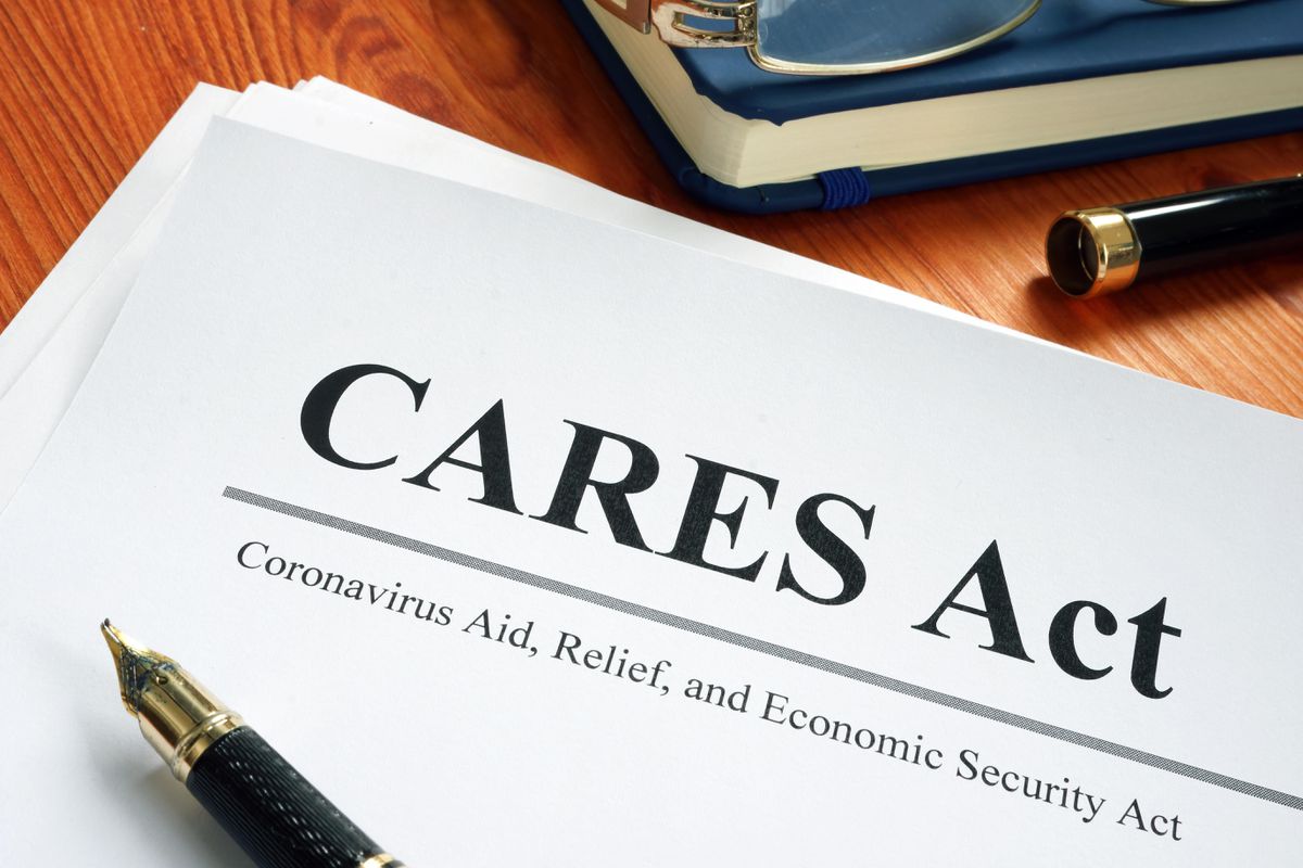 document titled cares act with fountain pen